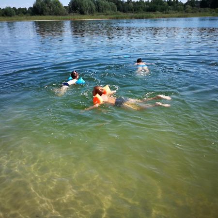 Domki Na Jeziorem Wilczynskim: Lakeside Cottages with A/C Zygmuntowo  Exterior photo
