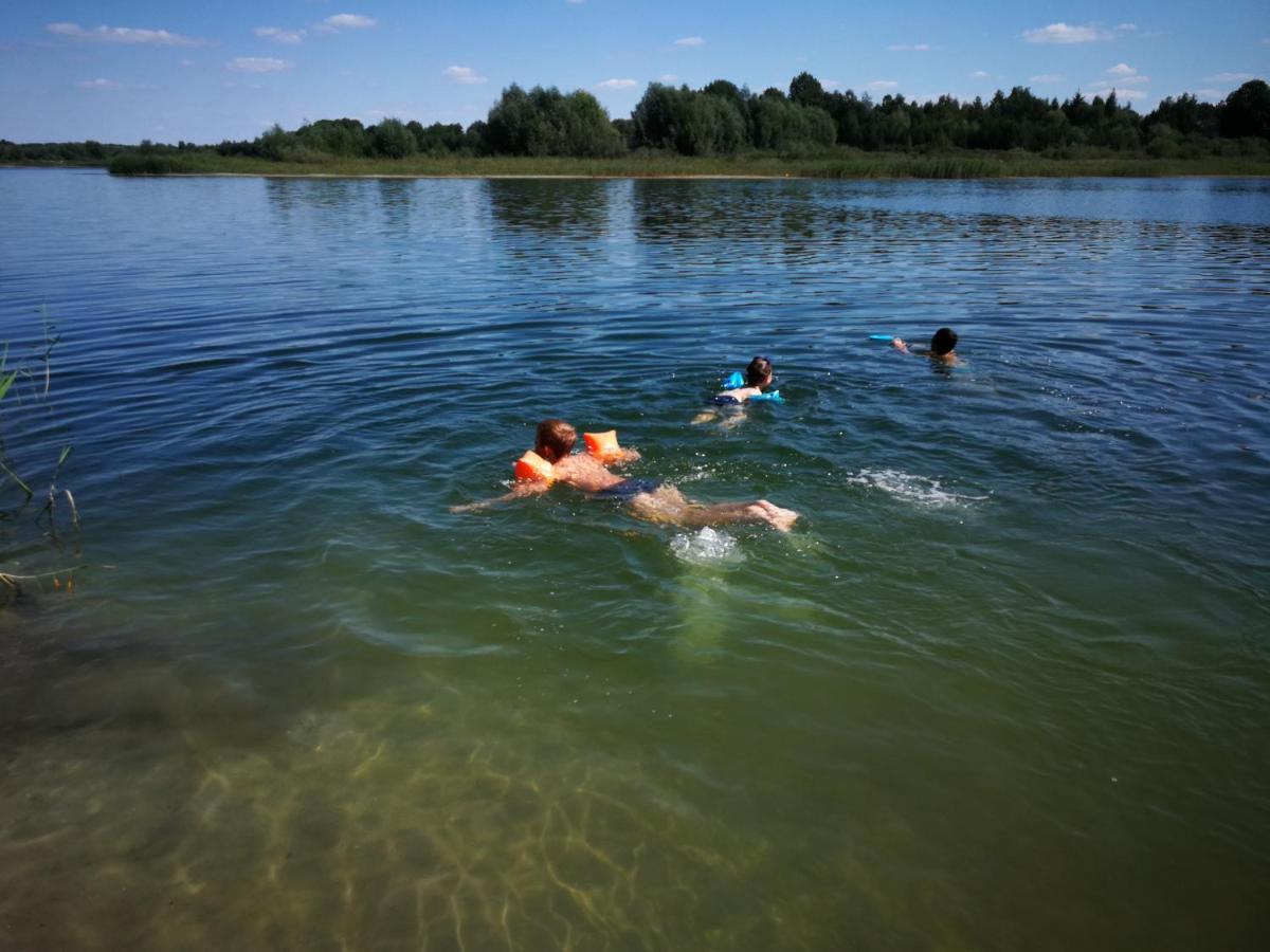 Domki Na Jeziorem Wilczynskim: Lakeside Cottages with A/C Zygmuntowo  Exterior photo